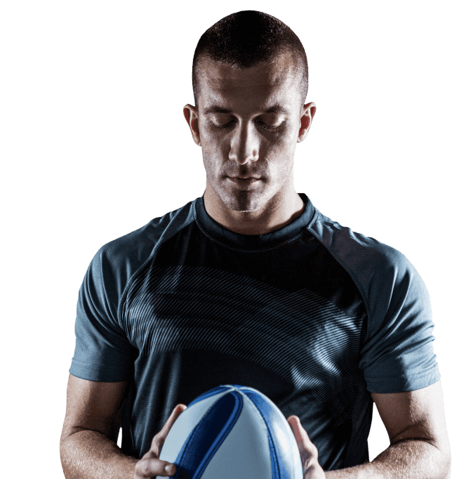 In thought, eyes closed, a player clasps a ball with both hands in front of them